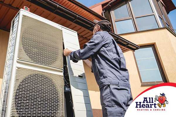 Technician works on A/C Repair Palmdale outdoor