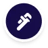 White wrench icon on a dark blue circular background.